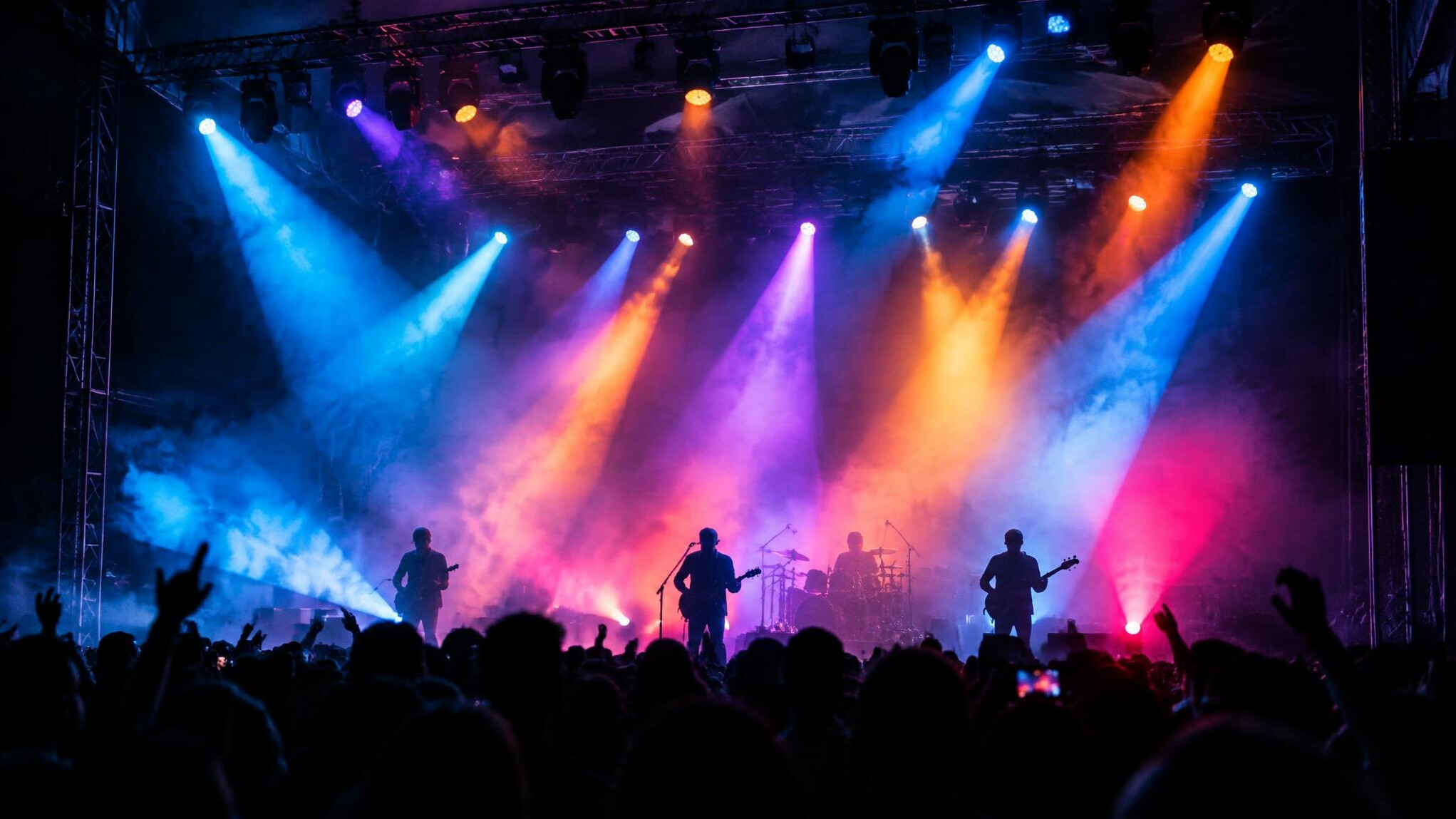 Sound engineer and lighting rig at a concert